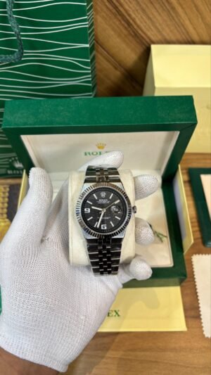 ROLEX OYESTER PERPETUAL LAND DWELLER SILVER BLACK DIAL