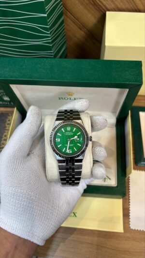ROLEX OYESTER PERPETUAL LAND DWELLER SILVER GREEN DIAL
