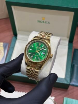 ROLEX OYSTER PERPETUAL DATE JUST GOLDEN GREEN DIAL