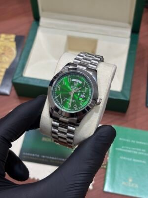 ROLEX OYSTER PERPETUAL SILVER GREEN ARABIC DIAL