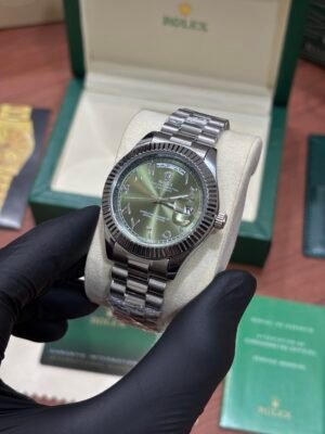ROLEX OYSTER PERPETUAL SILVER GREEN ARABIC DIAL